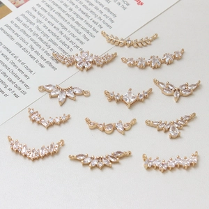 Macro detail of various gold-plated zircon connectors for DIY jewelry making