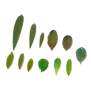DIY jewelry parts set with green resin leaves and bamboo leaf pendants for headpieces
