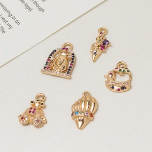 Golden pendant charms set with colorful cubic zirconia for DIY jewelry making