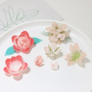 Handmade resin camellia and leaf charms for DIY hairpins and traditional jewelry making
