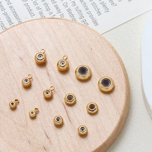 Golden silicone-lined spacer beads and slide stoppers for DIY jewelry making sets
