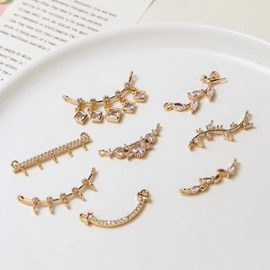 Macro shot of gold-plated jewelry connectors with micro-pave zircons for DIY accessory making