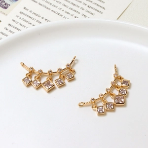 Detail of gold connectors with micro-set cubic zirconia for DIY jewelry making
