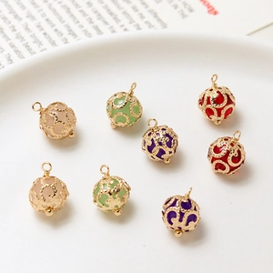 Hollow gold-tone filigree sphere pendants with colorful crystal beads inside for DIY jewelry