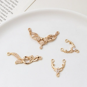 Close-up of gold plated micro-set zircon flower pendants for DIY jewelry making