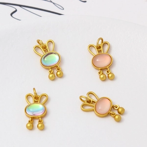 Sand gold rabbit pendants set with blue and pink gemstones for DIY jewelry crafts