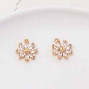 Detail showing gold daisy flower charms with marquise cut cubic zirconia for DIY jewelry