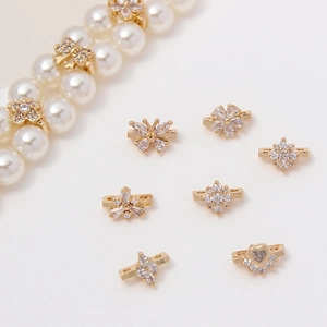 Separadores dorados de circonita para pulseras de perlas con formas de flor y corazón