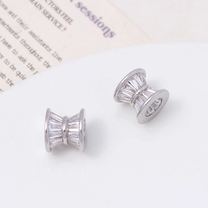 Detailed close-up of micro-paved zircon spacer beads for DIY jewelry making