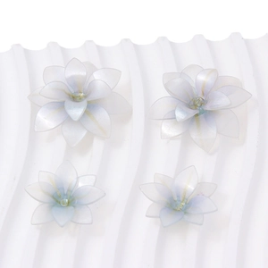 Pearlescent white and light blue gradient heat shrink flower charms for DIY hairpins