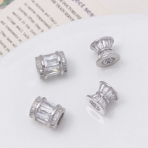 Macro shot of silver plated copper beads with micro-pave cubic zirconia for jewelry making