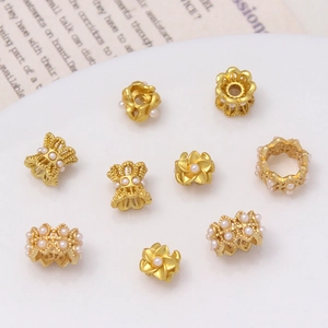 Exquisitas cuentas espaciadoras huecas doradas con perlas falsas para joyería DIY