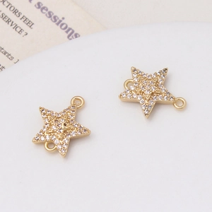 Detailed close-up of gold star jewelry connectors with micro-pave cubic zirconia stones