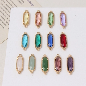 Set of 13 multi-colored crystal glass oval pendants with gold plated dual link connectors