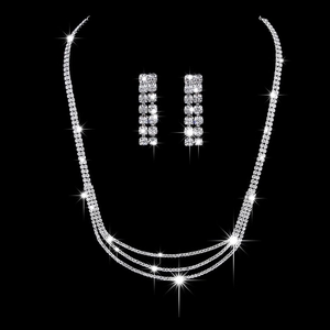 Elegant silver rhinestone jewelry set with layered necklace and long tassel earrings