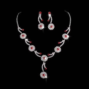 Elegant silver-tone jewelry set featuring red crystal floral necklace and matching earrings