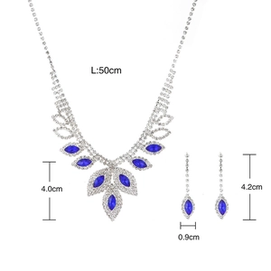 Wedding jewelry set featuring blue rhinestone teardrop necklace and drop earrings