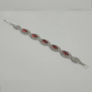 Elegant marquise-cut red stone bracelet with sparkling silver claw chain for bridal wear