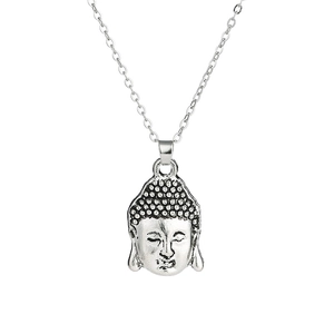 Retro Buddha head pendant necklace with silver link chain on white background