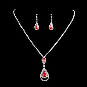 Elegant bridal jewelry set with red teardrop gemstones and necklace in silver finish