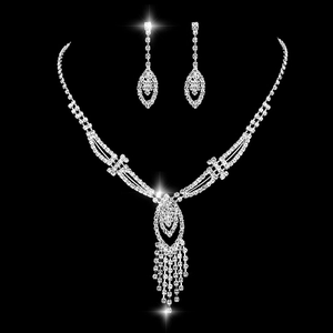 Elegant silver-toned bridal jewelry set with rhinestone tassels and diamond-shaped accents