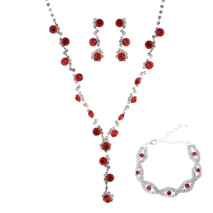 Elegant silver-plated jewelry set featuring red rhinestones with necklace, earrings and bracelet