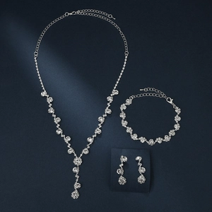 Sparkling sunflower rhinestone jewelry set with necklace, bracelet, and drop earrings