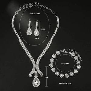 Detailed view of silver bridal jewelry set with dimensions and teardrop rhinestones