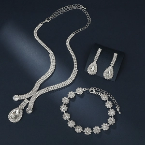 Sparkling silver bridal jewelry set with rhinestone necklace bracelet and earrings