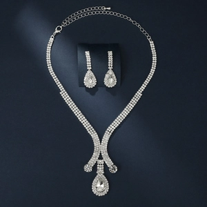 Silver bridal jewelry set with sparkling rhinestone necklace and teardrop earrings