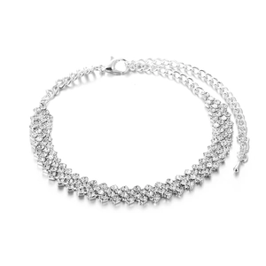 Elegant triple-row rhinestone bracelet with silver finish and adjustable water drop charm