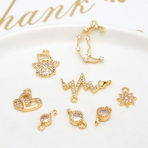 Gold plated DIY pendants with moon and heart charms featuring cubic zirconia stones