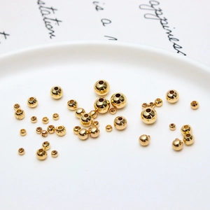 18K gold plated copper beads in smooth and engraved styles for DIY jewelry making