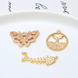 Gold-plated butterfly dolphin and fishbone charms with sparkling zircon inlay for DIY jewelry