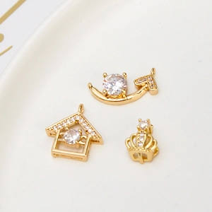 Three gold-plated brass DIY pendants with zircon in house, crescent moon and crown shapes