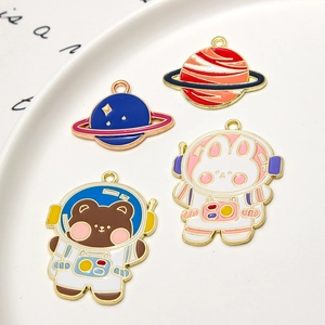 Cute cartoon astronaut and planet alloy charms with gold plating for DIY jewelry