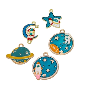 Space-themed alloy enamel charms set with astronaut, rocket, and planet shapes for DIY jewelry