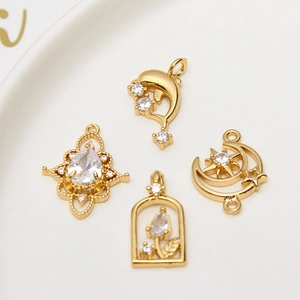 Gold plated cubic zirconia pendants with dolphin, star and moon designs for DIY jewelry