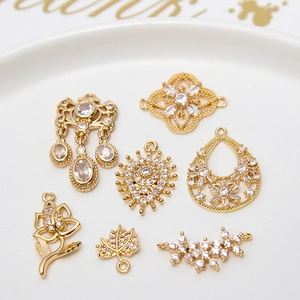 Golden flower and maple leaf pendants with zircon stones for DIY jewelry making
