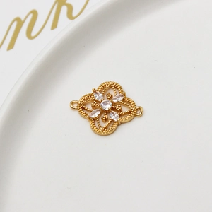 Macro view of gold-plated flower connector with marquise cubic zirconia for DIY jewelry