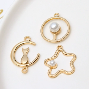 DIY gold alloy pendants set with pearls featuring cat, moon, and star designs for earrings
