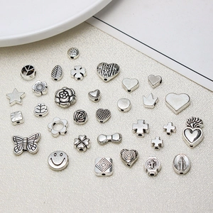 Vintage silver alloy DIY charms with butterfly heart and cross patterns for jewelry making