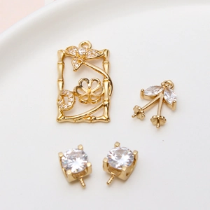 Golden hollowed pendant frames and zircon leaf charms for DIY jewelry making