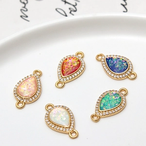 Waterdrop-shaped gold-plated copper connectors with opal-style stones for DIY jewelry making