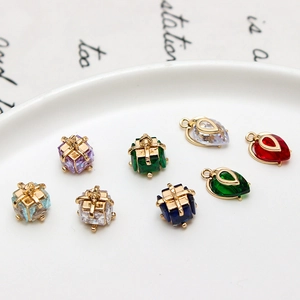 Detailed view of colorful zircon charms in gold finish for DIY jewelry making