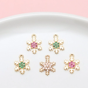 Colgantes de copo de nieve dorados con circonitas de colores para joyería artesanal