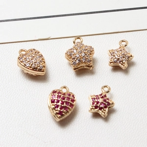 Golden copper heart and star pendants with white and pink cubic zirconia for DIY jewelry
