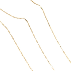 14K gold plated bamboo link chain with reflective metallic finish on white background