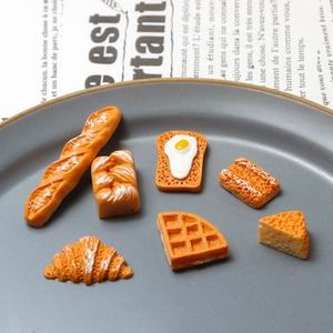 Detailed view of 7 pieces miniature resin bakery charms for DIY crafts and decor