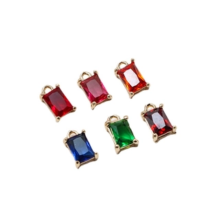 Set of six rectangular emerald-cut crystal charms in vibrant colors with gold metal setting